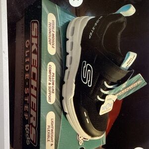 Skechers Kids Black and White Glide-Step Sneaker with Blue Accents